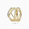 Anillo De Plata Entrelazado Dorado