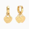 Aretes Huggies De Acero Amor Dorado