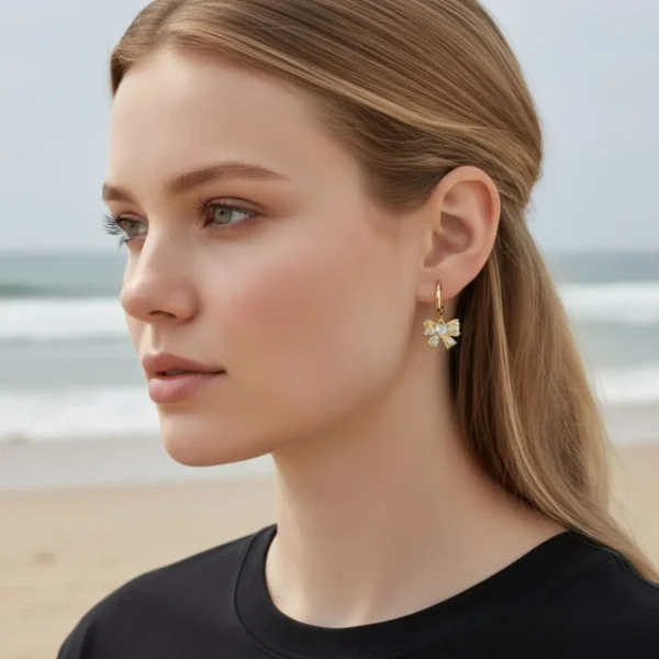 Aretes Huggies De Oro Moño Brillante Aretes Huggies De Oro Moño Brillante