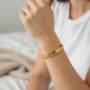 Pulsera De Acero Elastica Dorada
