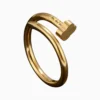 Anillo De Acero Clavo Trebol Dorado