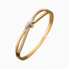 Pulsera De Acero Brazalete Nudo Dorado
